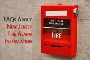 Text: FAQs About New Jersey Fire Alarm Installation; Photo of a fire alarm