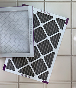 A clean vs a dirty filter from HVAC maintenance in Ocean County service call